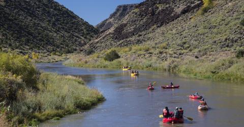 kayakers at the rio-grande del norte national monument